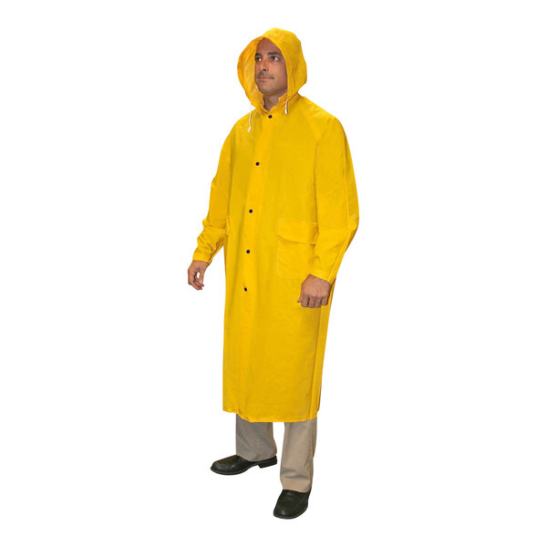 A man wearing a yellow Cordova Renegade raincoat.