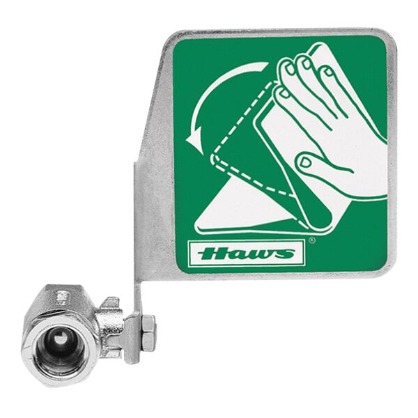 A green and white sign with a hand using a horizontal valve.