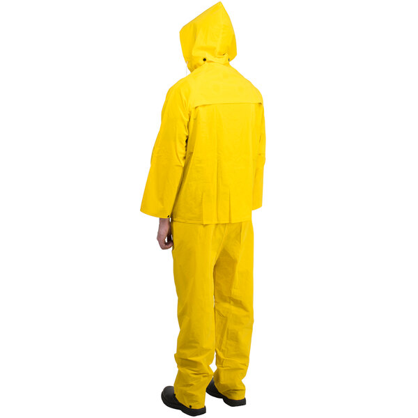A person wearing a yellow Cordova StormFront rainsuit.