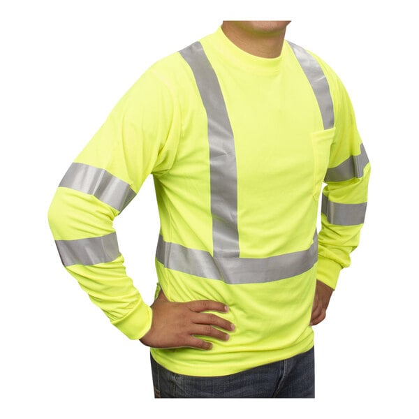 A person wearing a Cordova hi-vis lime safety shirt with reflective tape.