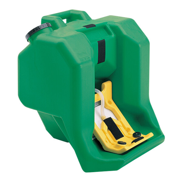 A green and yellow plastic Haws eye wash station with a yellow handle.