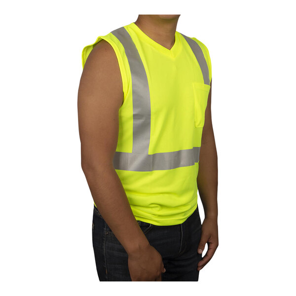 A man wearing a Cordova hi-vis lime mesh sleeveless safety shirt with reflective tape.
