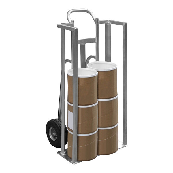 A Valley Craft hand truck with brown barrels on it.