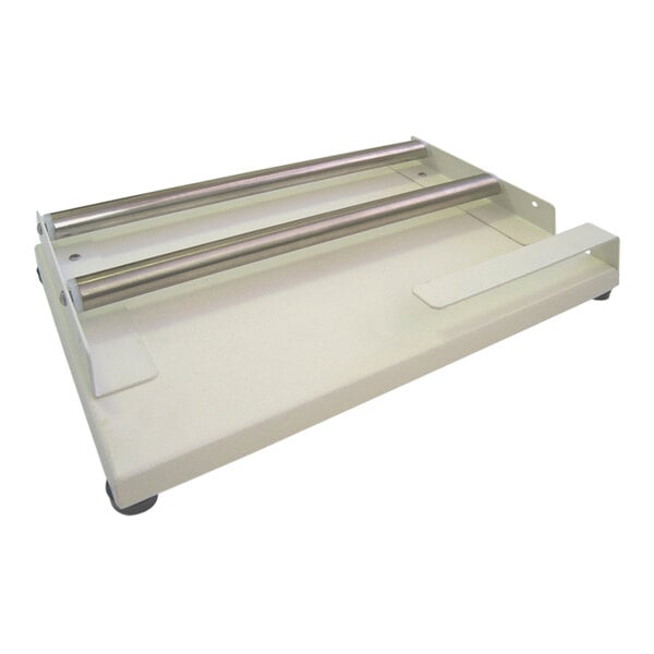 A white metal tray with two metal rollers.