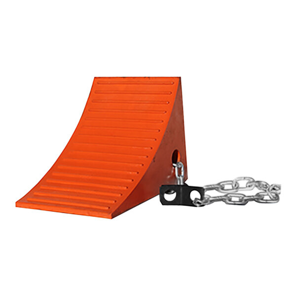 An orange urethane wheel chock with a chain attached to it.