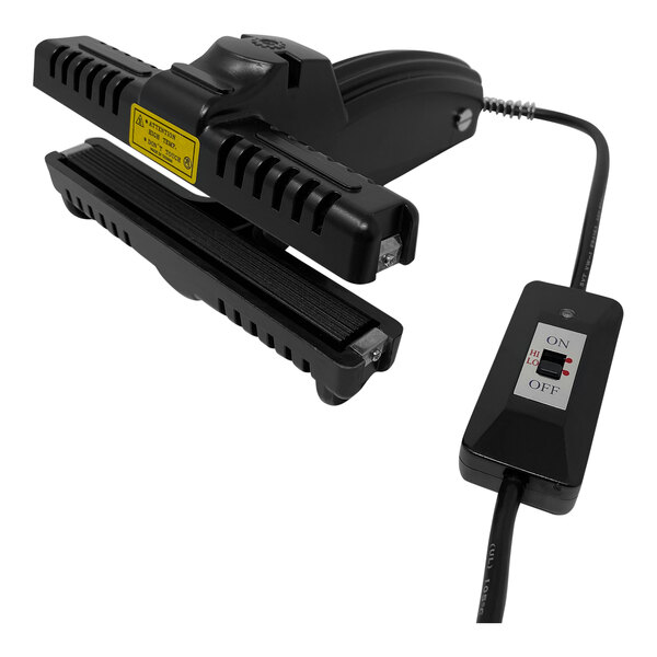 A close-up of a black Sealer Sales portable direct heat sealer with a yellow and white label and a black cord.