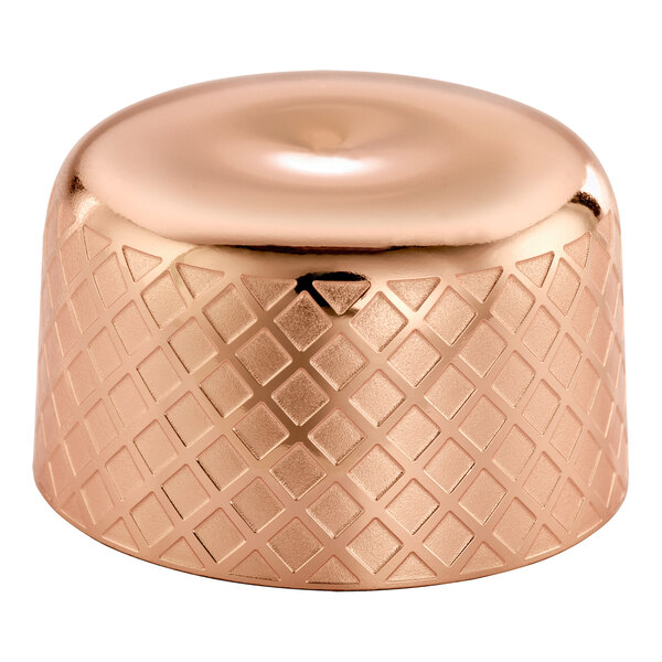 A copper-plated metal cap with a diamond lattice pattern.