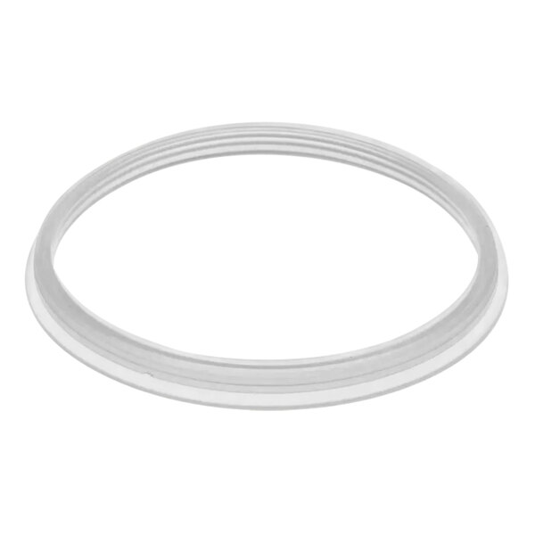 A white plastic circle with a small hole.