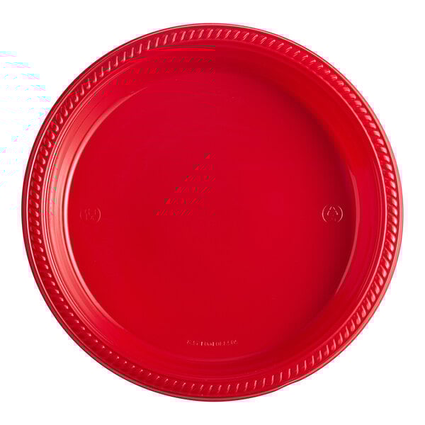 A close-up of a red Choice plastic plate with a braided edge.