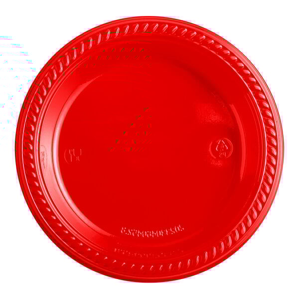 A red plastic plate with a braided edge.