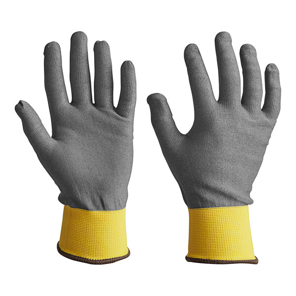 A close-up of a pair of gray and yellow Armor Guys Kyorene Pro cut-resistant gloves.