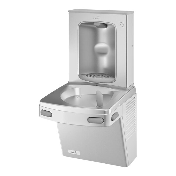 A stainless steel Oasis water fountain with a contactless bottle filler and water tap.