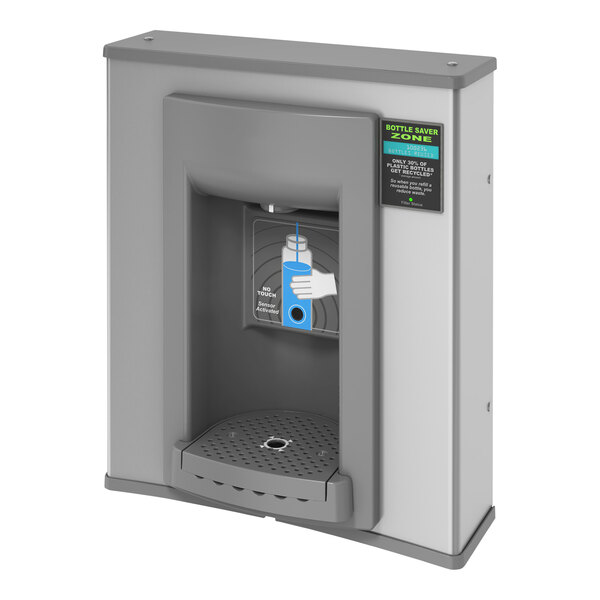 A hand holding a blue bottle in a grey rectangular water dispenser with a blue button.