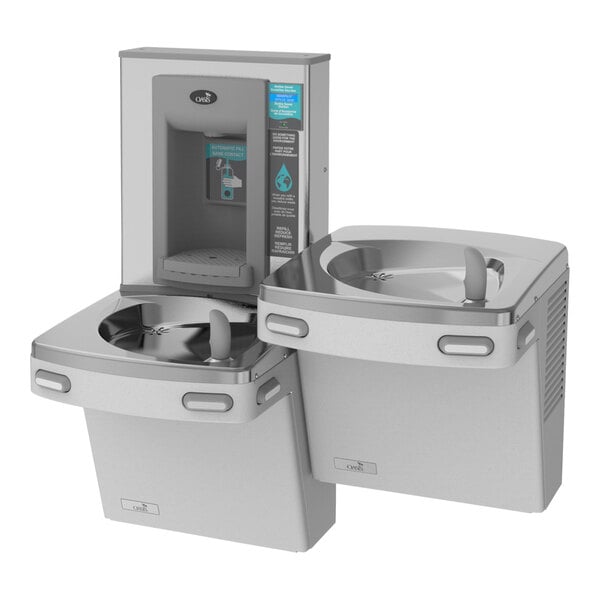 A greystone stainless steel Oasis bi-level drinking fountain with hands-free bottle filler.