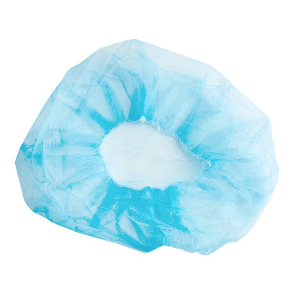 A blue Choice polypropylene bouffant cap in a clear plastic bag with a white circle.
