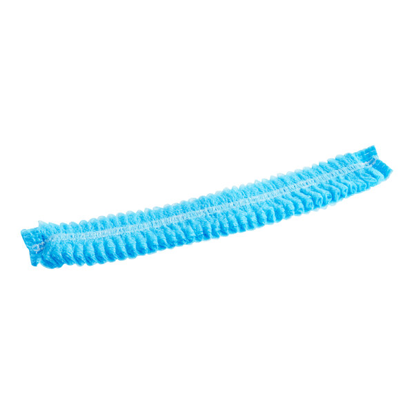 A blue polypropylene shoe cover with an anti-skid bottom on a white background.