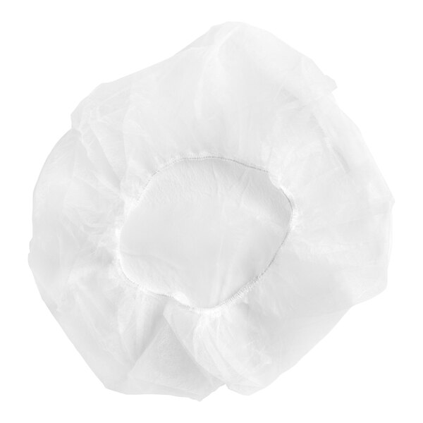 A white polypropylene bouffant cap with a circle in the middle.