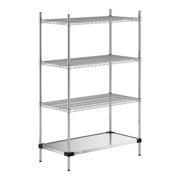 A four-tier chrome wire shelving unit with three wire shelves and one solid metal bottom shelf, supported by four vertical posts.