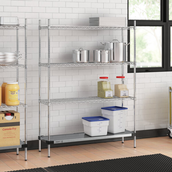 A Regency chrome wire shelving unit with a solid metal shelf.