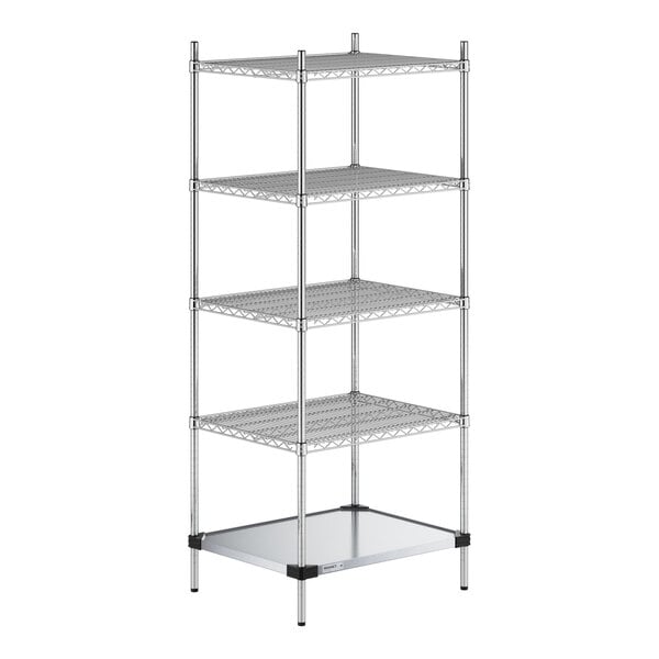 A five-tier chrome wire shelving unit with four wire shelves and one solid metal shelf at the bottom, supported by four vertical posts.