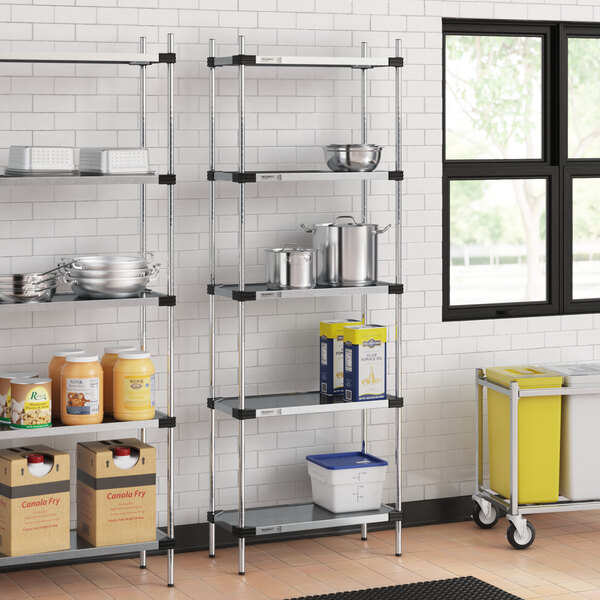 Regency galvanized steel shelves in a school kitchen.