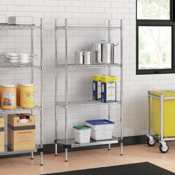 A Regency stainless steel wire shelving unit with a solid metal bottom shelf.