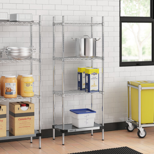 Regency chrome wire shelving with solid metal bottom shelf in a kitchen.