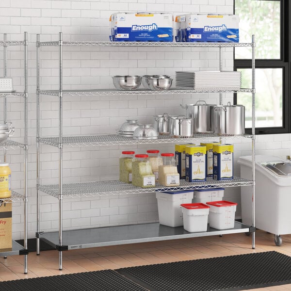 A Regency metal wire shelf kit with a white container on the bottom shelf.