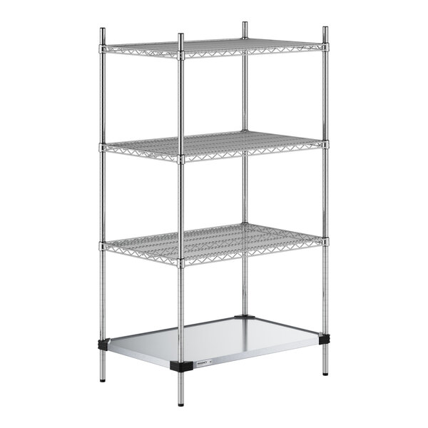 A four-tier chrome wire shelving unit with three wire shelves and one solid metal shelf at the bottom, supported by four vertical posts.