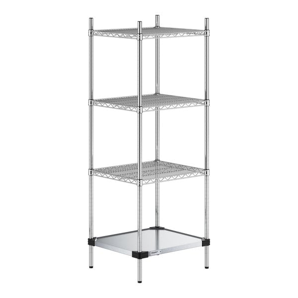 A four-tier chrome wire shelving unit with three wire shelves and one solid metal shelf at the bottom, supported by four vertical posts.