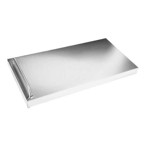 A stainless steel rectangular object with a black handle.