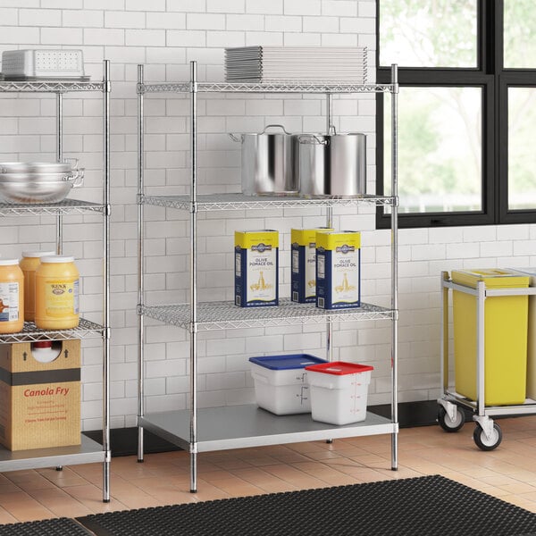 A stainless steel wire shelf kit with containers on the bottom shelf.