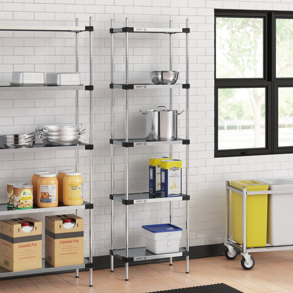 Regency galvanized steel shelves in a school kitchen.