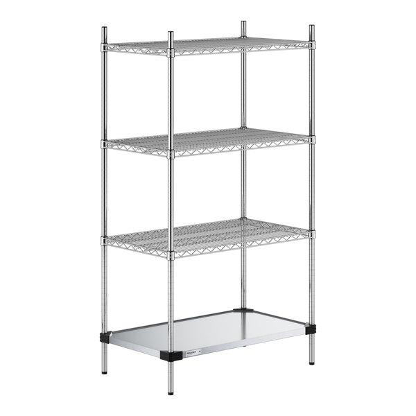 A four-tier chrome wire shelving unit with three wire shelves and one solid metal shelf at the bottom, supported by four vertical posts.
