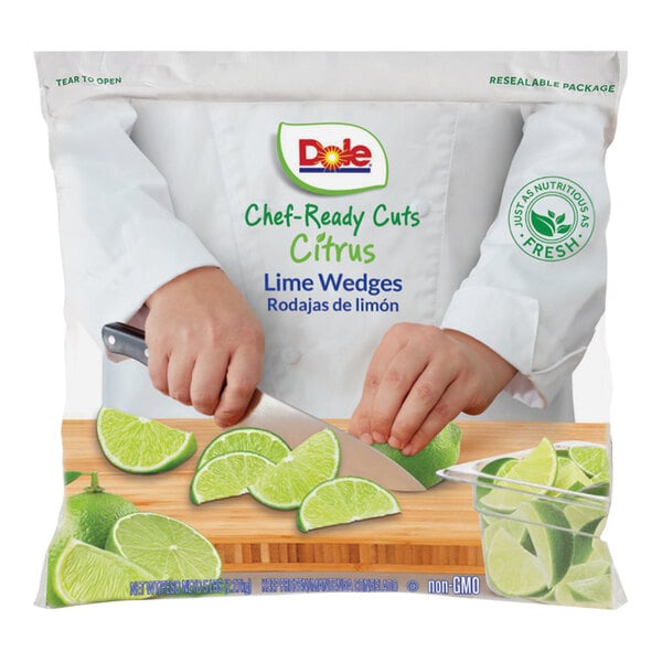 A case of Dole Chef-Ready Cuts IQF Lime Wedges on a counter.