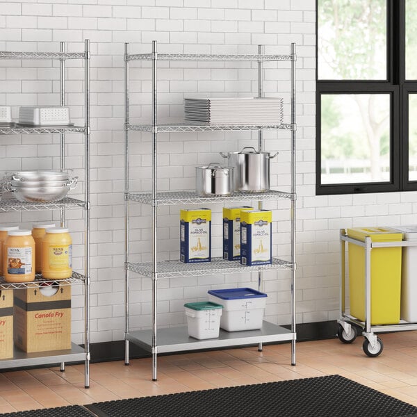 A stainless steel wire shelf kit with solid stainless steel bottom and 5 shelves on 74" posts.