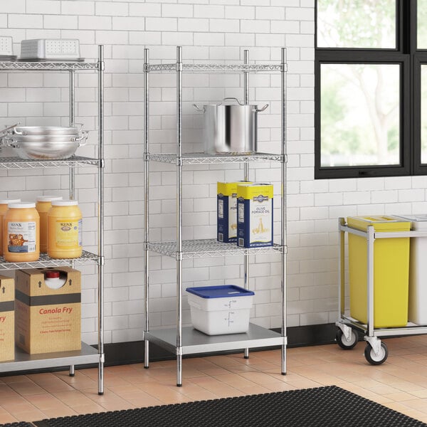Stainless steel wire shelf kit with solid stainless steel shelves in a professional kitchen.