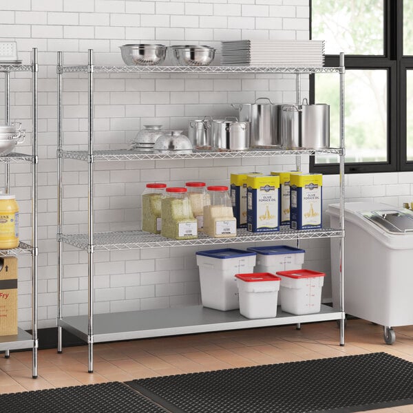 Stainless steel wire shelf kit with solid stainless steel bottom shelves on 64" posts.