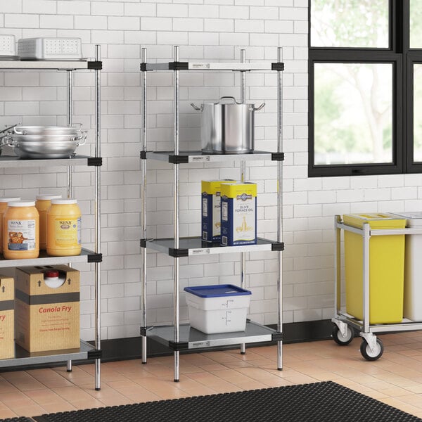 Regency galvanized steel shelves in a professional kitchen.