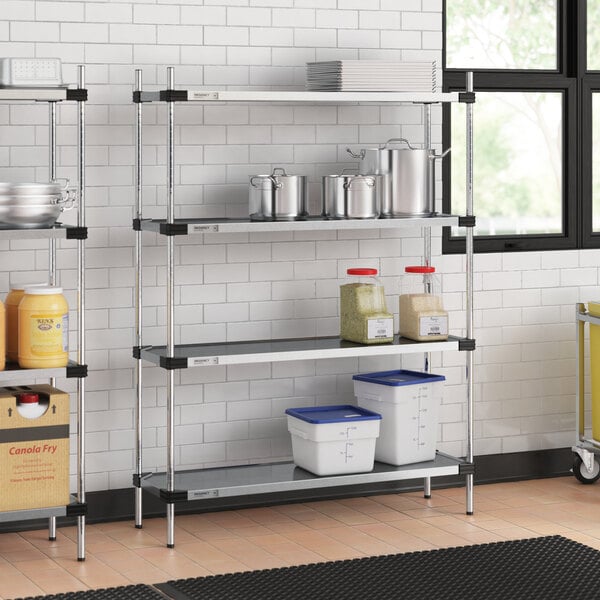 A Regency solid galvanized steel shelving unit in a professional kitchen.