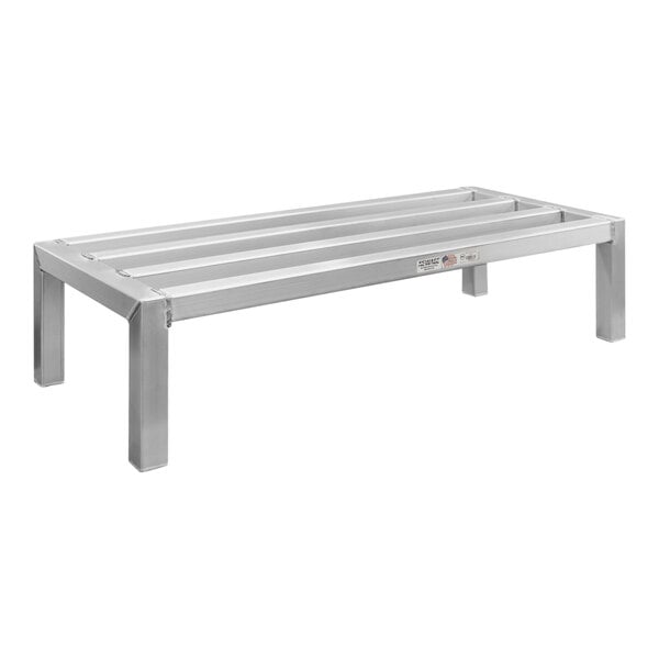 A New Age aluminum dunnage rack with metal legs.