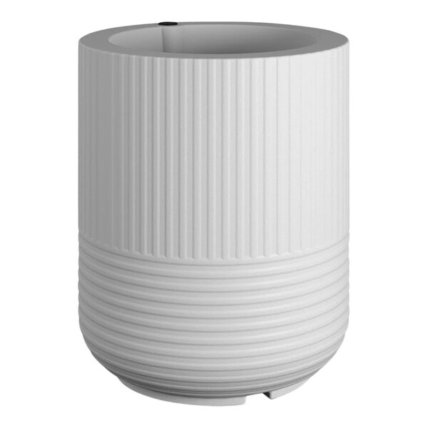 A white round planter with a white rim.