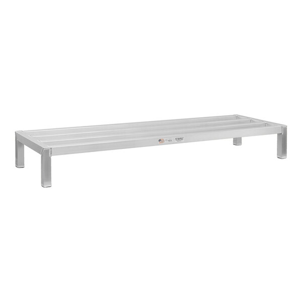 A white metal New Age dunnage rack with legs.