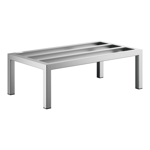 A rectangular, stainless steel rack with four legs and three recessed channels on top.