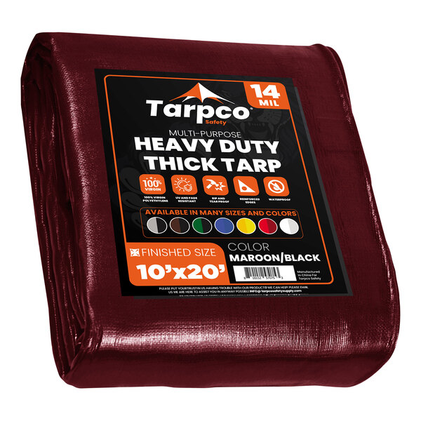 A maroon tarp with black and white text reading "Tarpco Safety" and "Extra Heavy-Duty"