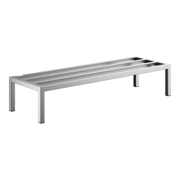 A rectangular, stainless steel rack with four legs and three long, recessed channels on top.