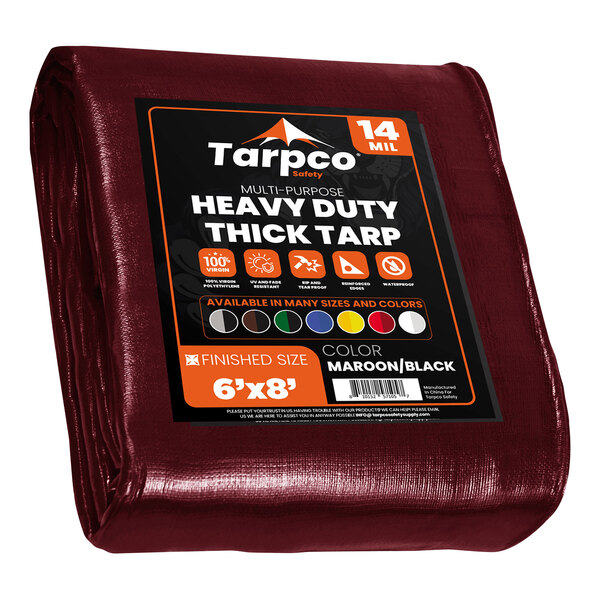 A maroon and black Tarpco safety tarp with reinforced edges.