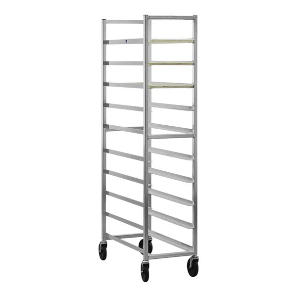 A New Age aluminum platter rack with four tiers on wheels.