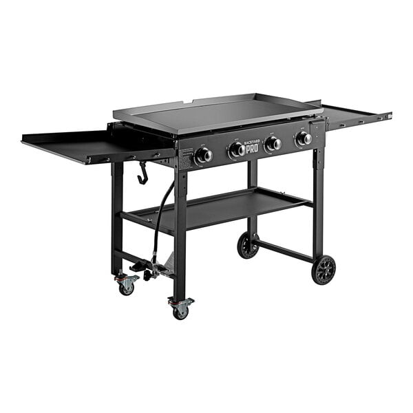 A black Backyard Pro mobile outdoor griddle on a table with wheels.