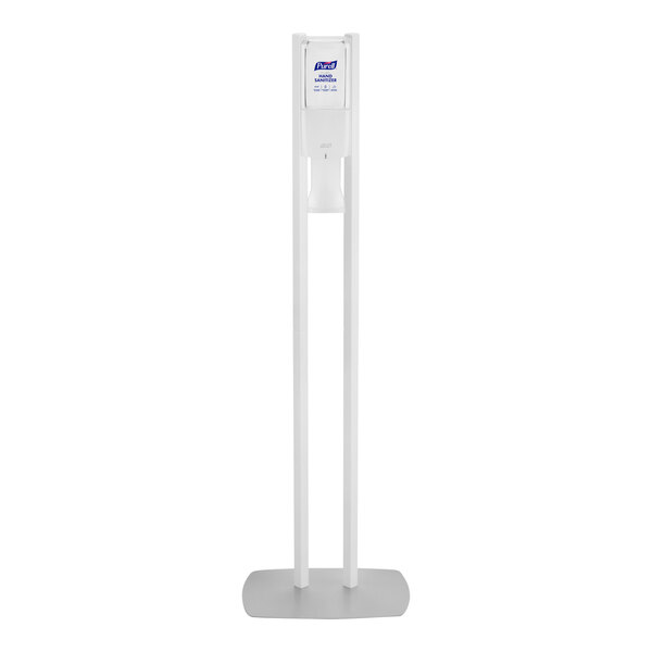 A white rectangular floor stand with a Purell hand sanitizer dispenser.
